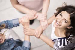Woman in group therapy smiling