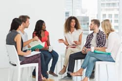 group of people in therapy session